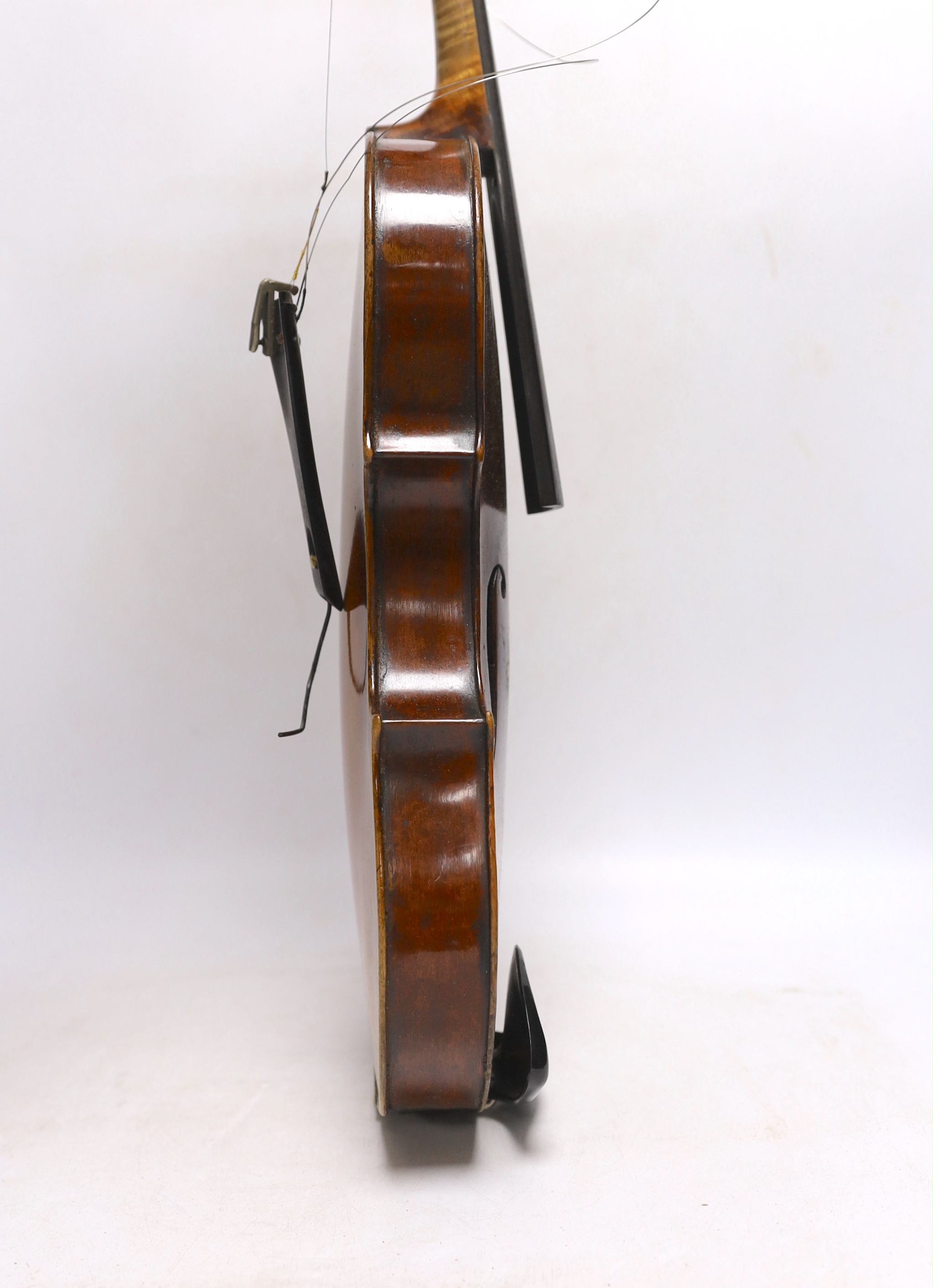 A violin labelled 'Albani Palermo', cased, length of back 35.5cm